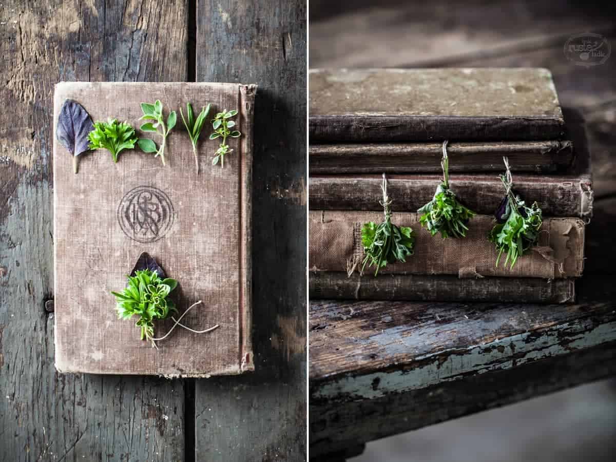 Herb Wreath Craft deconstructed herb bouquet and three herb bouquets hanging to dry off some books. 