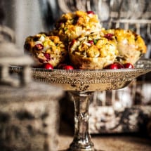 Cranberry Sage Stuffins on raised cake plate in rustic setting