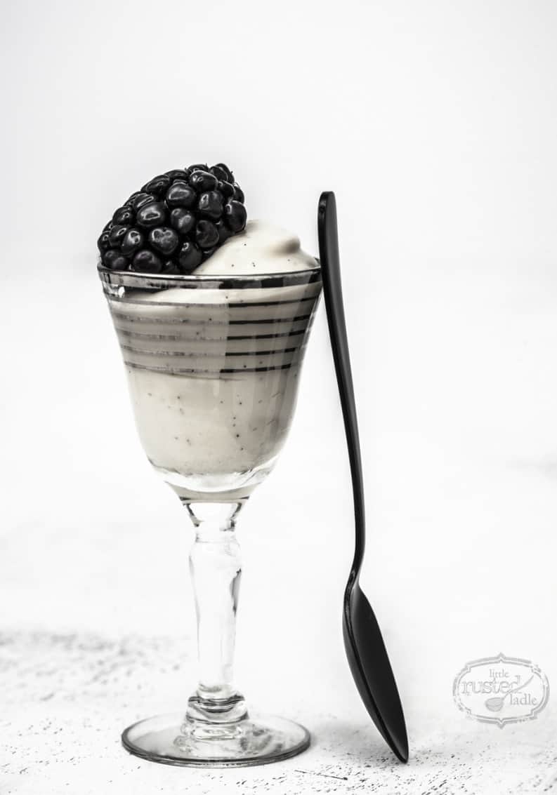 Black & White Appetizer Recipes | Vanilla Custard with Blackberries in little dessert glass with spoon leaning against it.