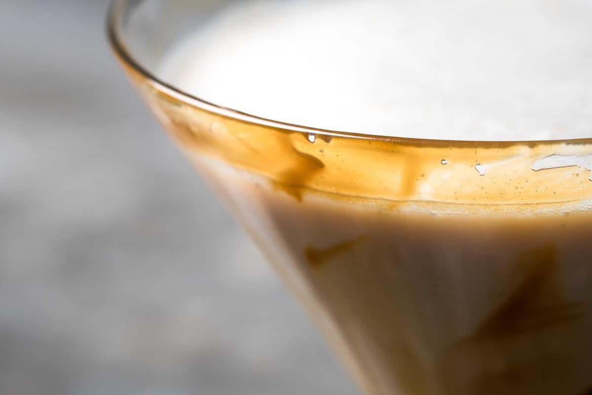 Close up detail of caramel on martini