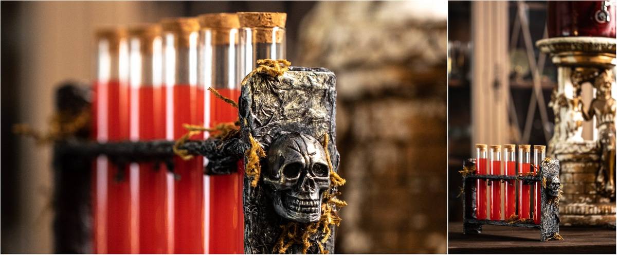 Two views of the poition vials holder in place on a halloween treats table. Red halloween shots in vials. 