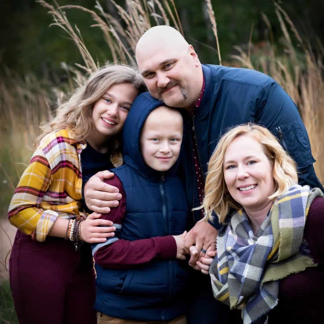 Family Photo outside apple picking