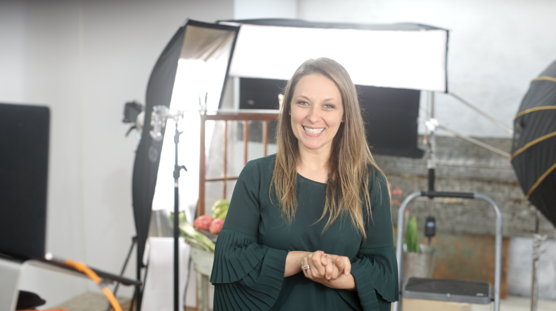 Jena Carlin in front of artificial light food photography set