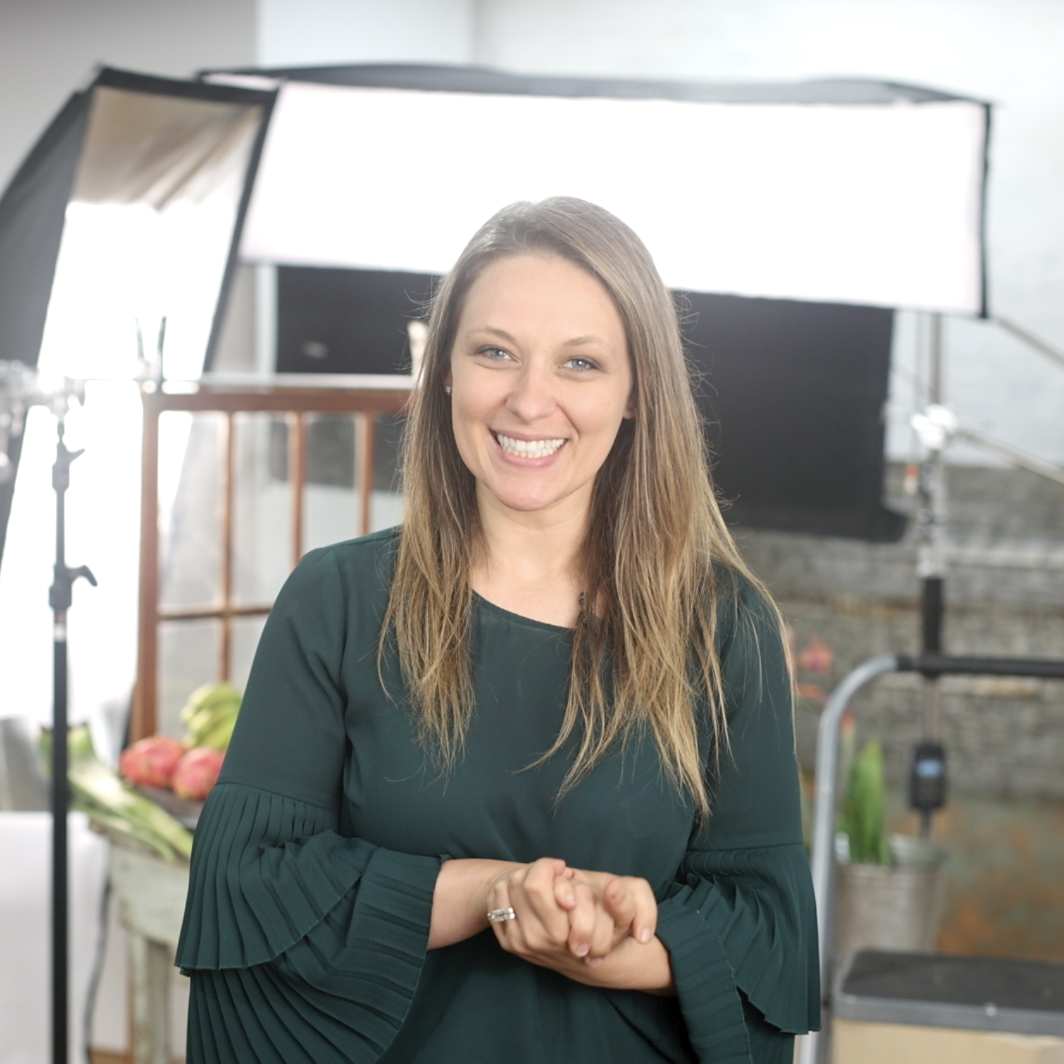 Jena Carlin in front of artificial light food photography set